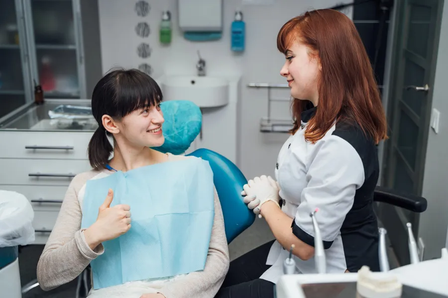 dentist and patient sharing a positive interaction in a dental office wisdom tooth removal gastonia nc