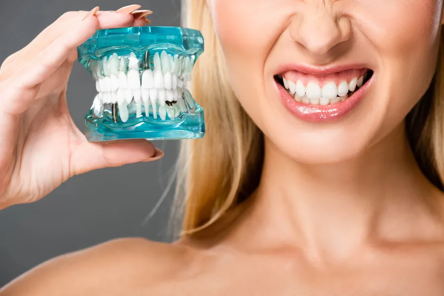 woman smiling with teeth whitening hickory nc tray