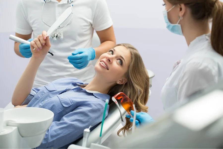 patient reviewing treatment with dentist harrisburg nc before procedure