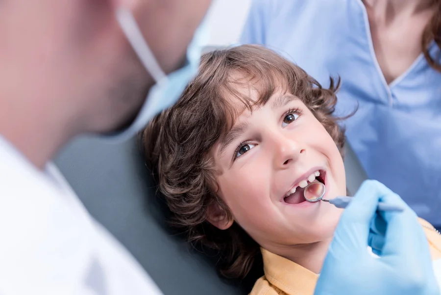 child-smiling-during-checkup-at-family-dentistry-harrisburg-nc