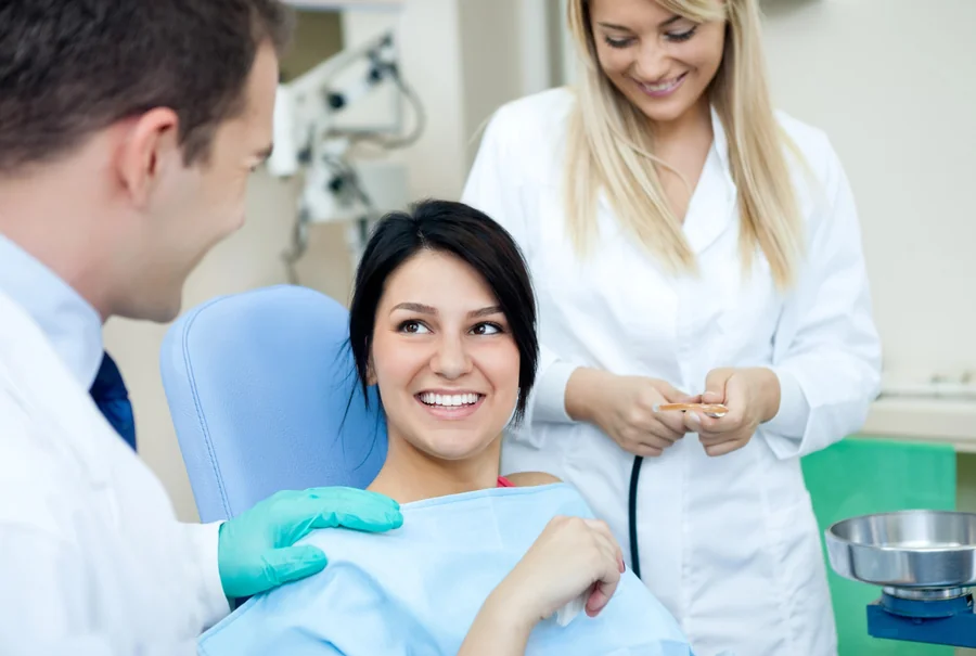 friendly-hickory-nc-dentist-helping-patient-feel-comfortable-before-treatment