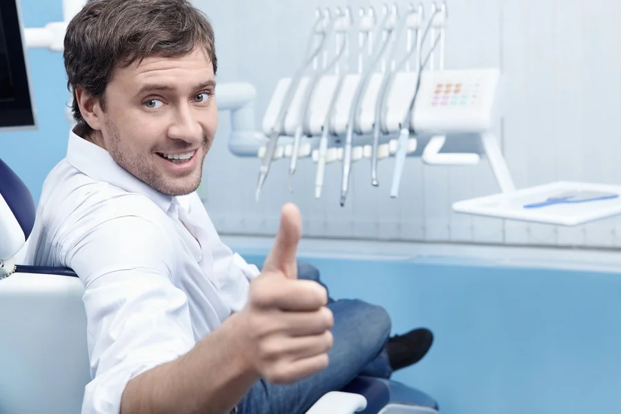 happy-patient-at-dentist-28075-after-successful-dental-visit