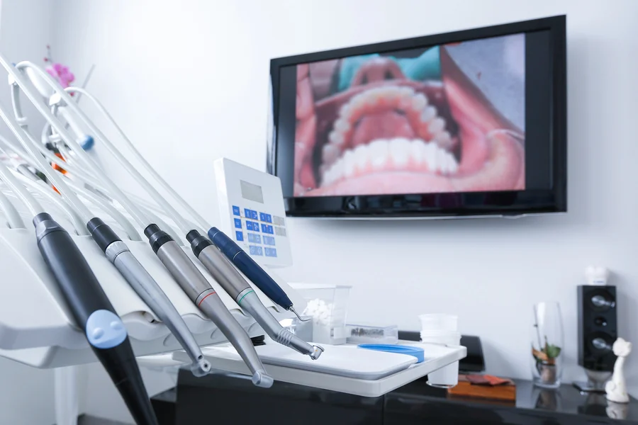 root canal treatment hickory nc dental handpieces and screen showing patient teeth